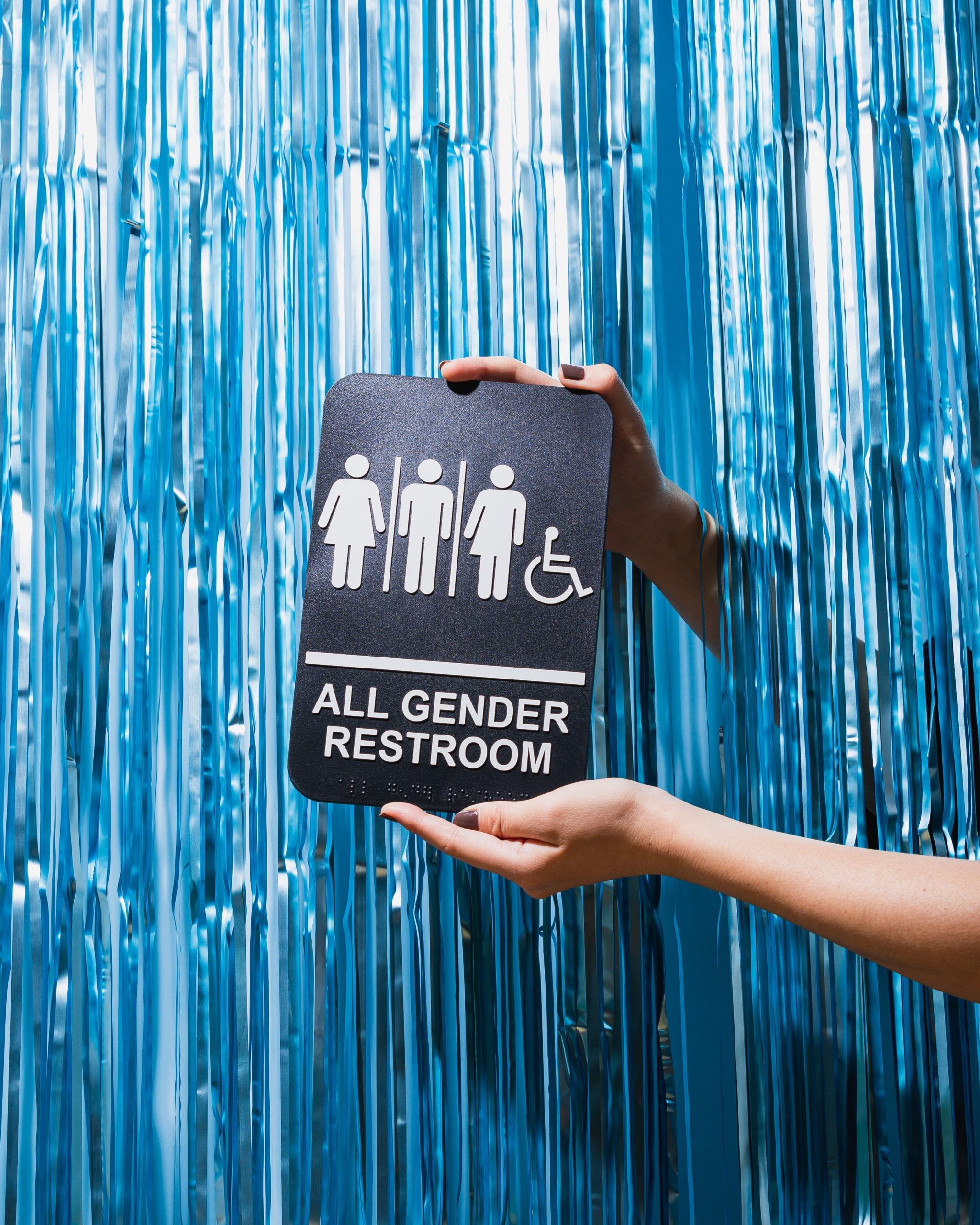 image of a all gender restroom sign | portable toilet rental washington oregon