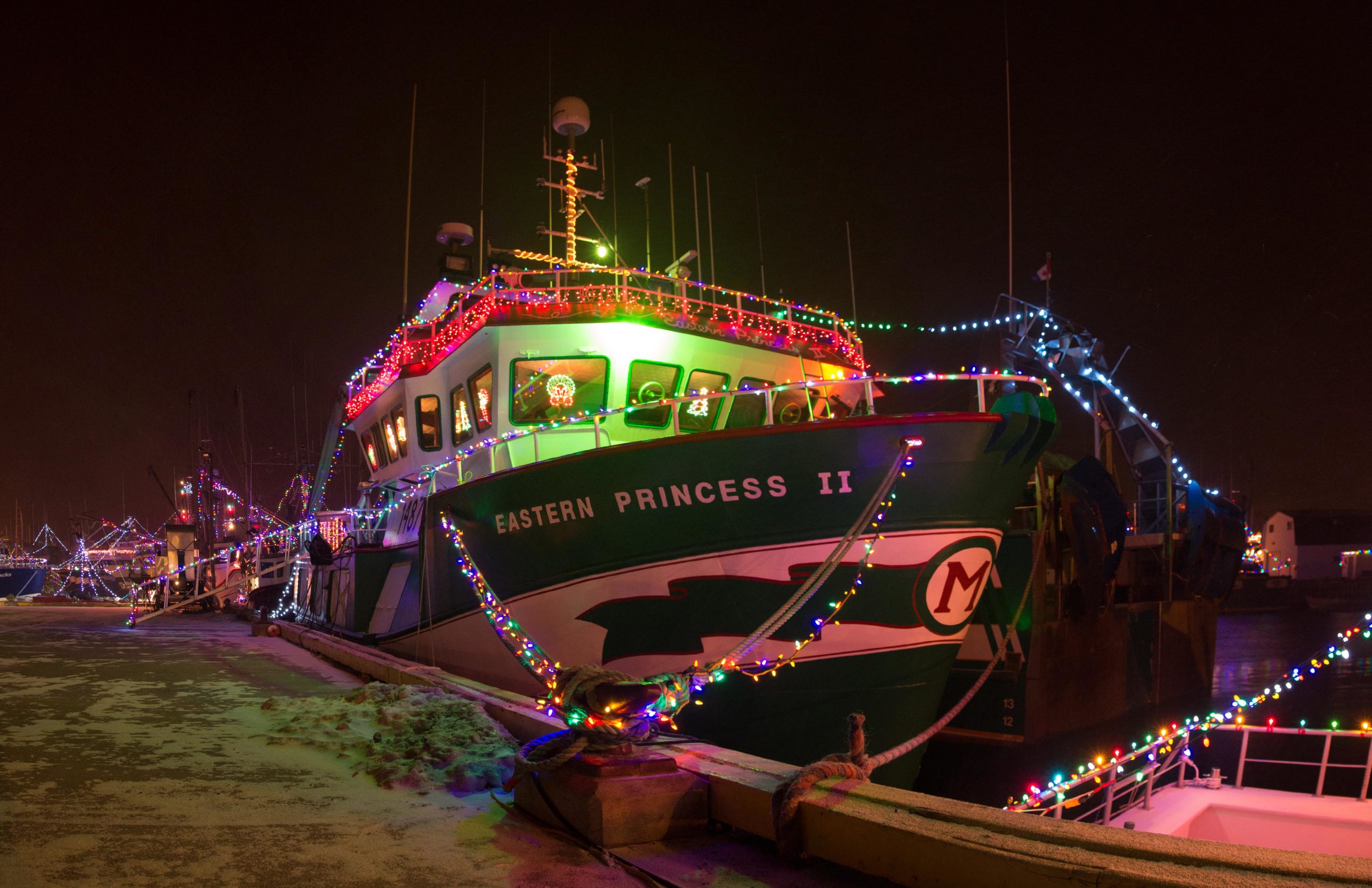 image of boat decorated with christmas lights  | oregon portable toilet rentals vancouver salem portland