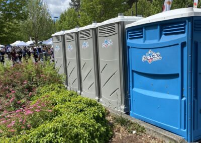 ADA compliant porta-potty at a festival.